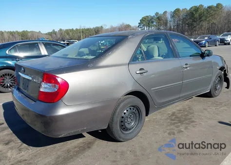2003 Toyota Camry Le z USA, uszkodzony, nr VIN 4T1BE32K63U701774
